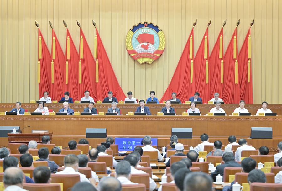 全国政协十四届常委会第三次会议闭幕 王沪宁主持并讲话